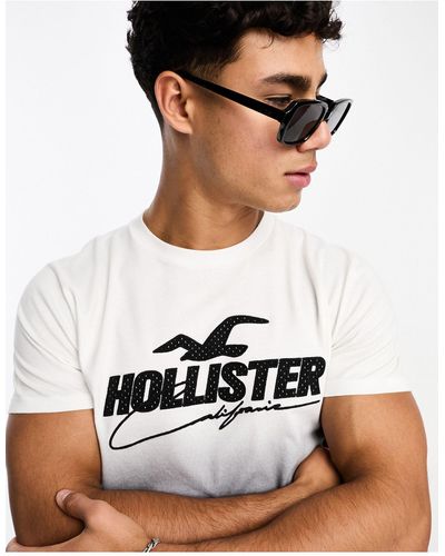 Hollister Camiseta blanca y negra con diseño degradado y aplicación - Negro