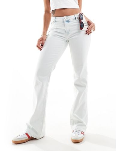 Monki Wakumi Low Waisted Boot Cut Jeans - White