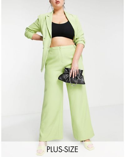 Missguided Pantaloni con fondo ampio e spacchi color lime - Verde