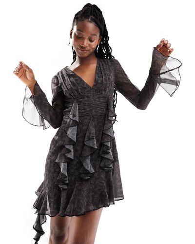 Reclaimed (vintage) – gemustertes minikleid aus spitze mit rüschen - Schwarz