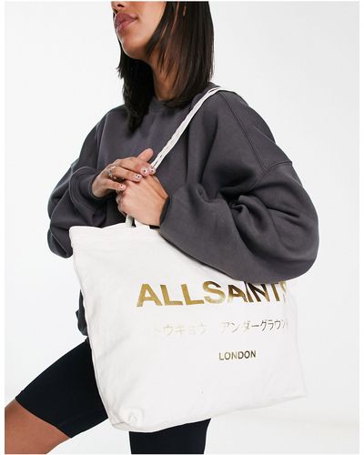 AllSaints Underground - borsa shopping bianca e oro laminata - Bianco
