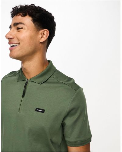 Calvin Klein – polohemd aus verschiedenen materialien und interlock-nylon - Grün