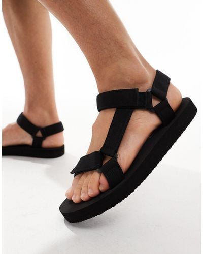 Truffle Collection – sandalen mit breiten riemchen aus webstoff - Schwarz