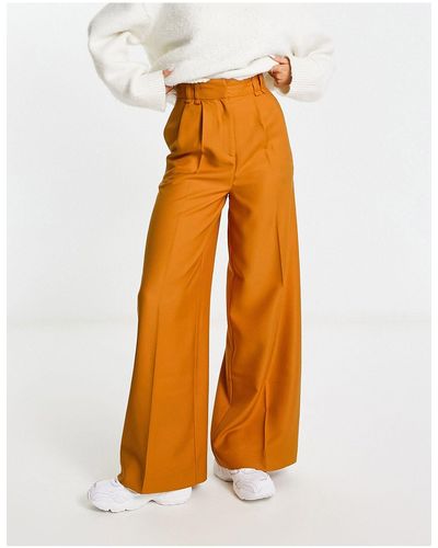 ASOS Pantaloni a vita alta con fondo ampio arancioni - Bianco