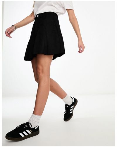 In The Style Exclusive Box Pleat Denim Mini Skirt - Black