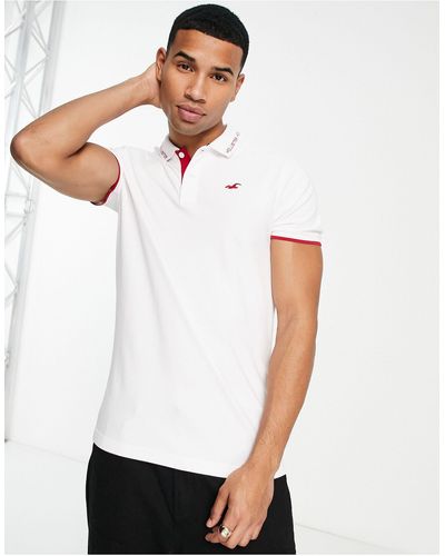 Hollister Polo con ribetes y logo universitario - Blanco