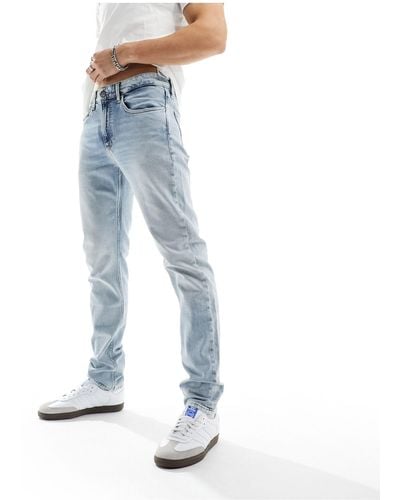 Calvin Klein Slim Tapered Jeans - Blue