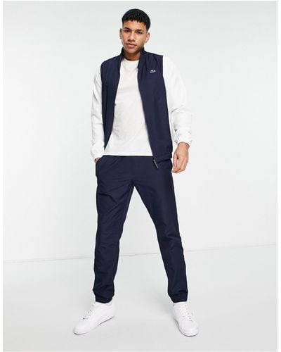 Lacoste Tracksuit With Taped Logo Detail - Blue