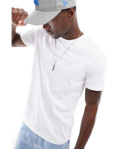 Hollister Camiseta blanca con cuello redondo y logo - Blanco