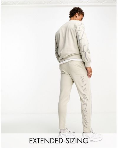 Armani Exchange Scattered Logo joggers Light Beige Mix And Match - White