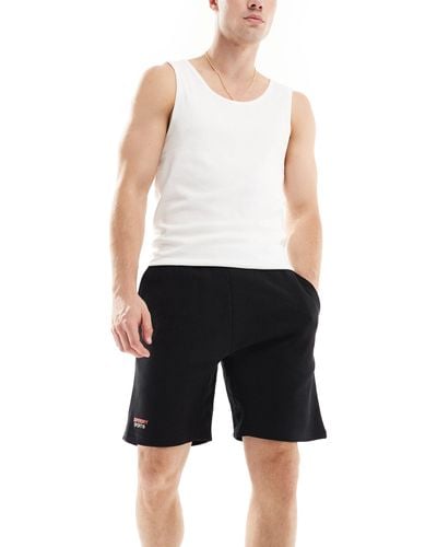 Superdry – sport – schmal zulaufende, funktionale shorts - Schwarz