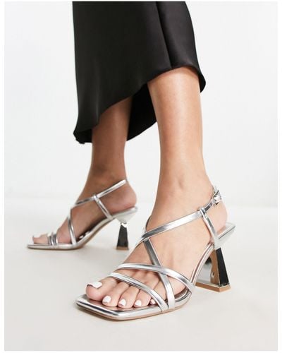Schuh Esclusiva - scarlett - sandali con tacco e fascette color metallizzato - Nero