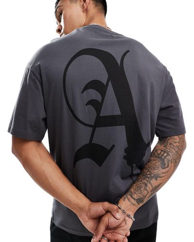 ADPT T-shirt oversize grigia con stampa "a" sul retro - Grigio