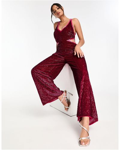 Miss Selfridge Tuta jumpsuit premium a fondo ampio decorata con cut-out - Rosso