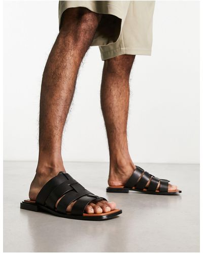 ASRA Sani - sandales plates en cuir - noir épicé