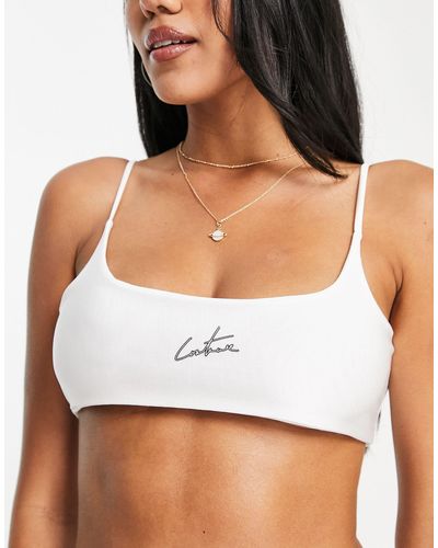 The Couture Club Top bikini con scollo rotondo e logo - Bianco