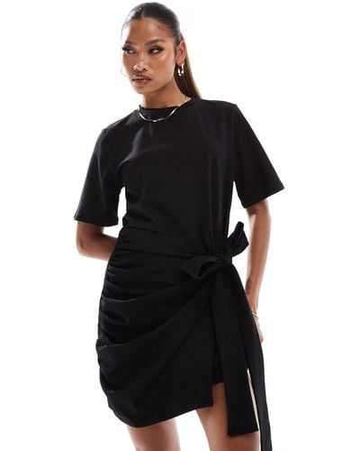 In The Style Exclusive Wrap Tie Side Mini T-shirt Dress - Black