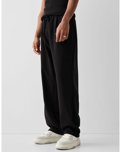 Bershka Pantalon large ajusté - Noir