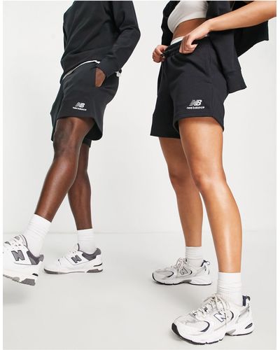 New Balance Pantalones cortos s unisex con logo - Negro
