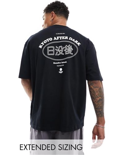 ASOS T-shirt oversize nera con stampa stile souvenir sul davanti - Blu