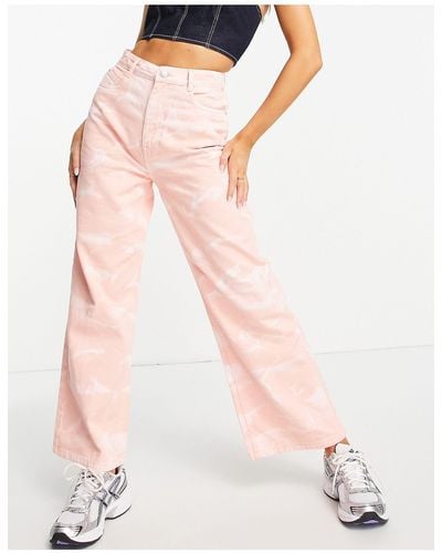 Urban Bliss Jeans con fondo ampio con stampa effetto inchiostro - Rosa