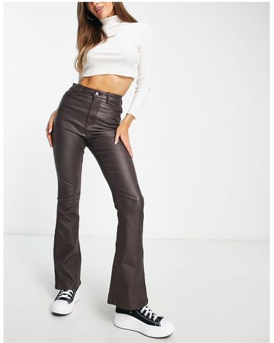 New Look Jeans a zampa marrone scuro spalmato - Bianco