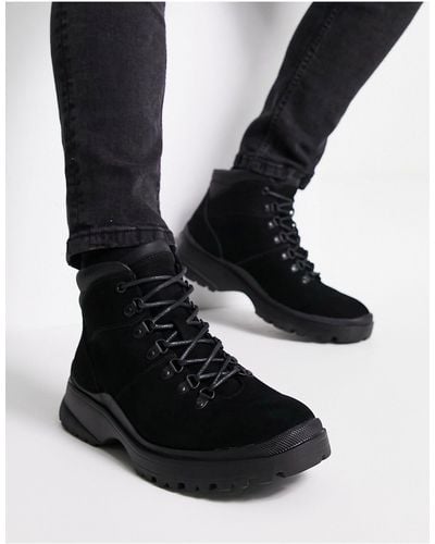 Schuh Botas con cordones y suela gruesa - Negro