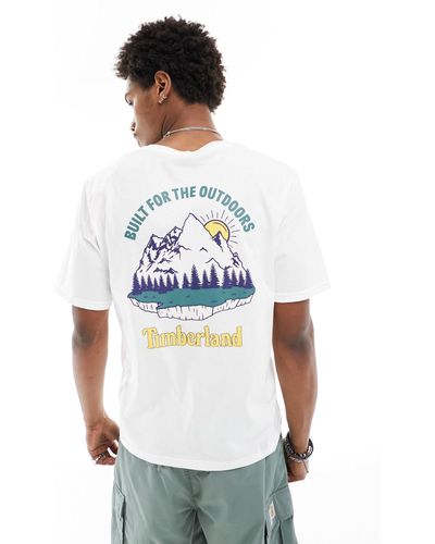 Timberland T-shirt oversize bianca con stampa di paesaggio di montagna sul retro - Bianco