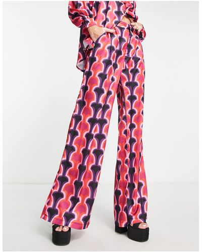 In The Style Pantaloni a zampa con stampa geometrica - Rosso