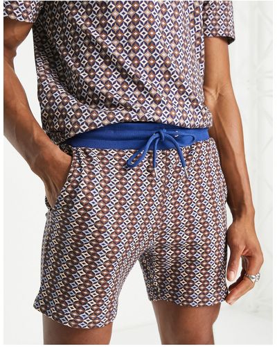 ASOS Pantalones cortos extragrandes con estampado geométrico - Multicolor