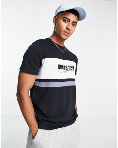 Hollister Camiseta negra con panel delantero con logo - Azul