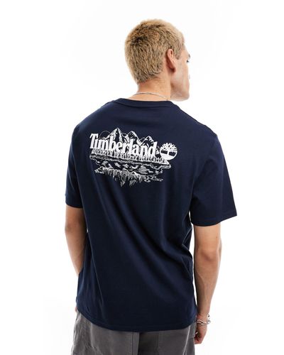 Timberland T-shirt oversize blu navy con stampa grande di montagne sulla schiena
