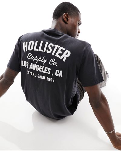 Hollister Camiseta negra con detalle bordado en la espalda - Negro