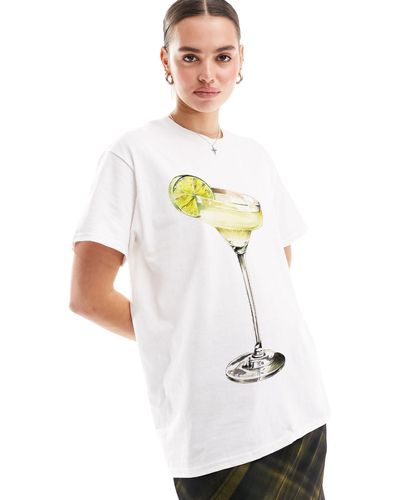ASOS T-shirt oversize bianca con grafica con cocktail al lime - Bianco