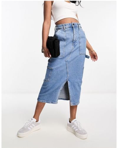 WÅVEN Julie - jupe longue utilitaire en jean avec poches style années 90 - Bleu