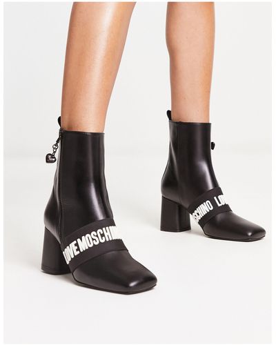Love Moschino Stivali con tacco neri con dettaglio del logo - Nero