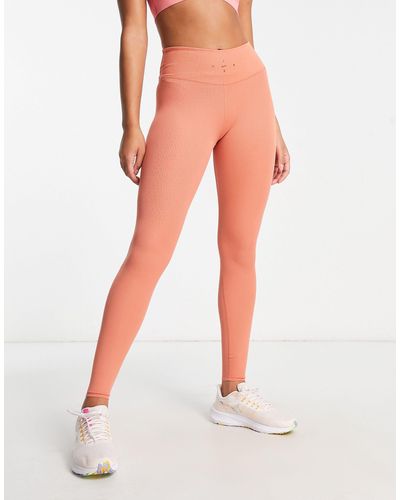 Nike Dri-fit One Luxe 7/8 Ribbed leggings - Orange