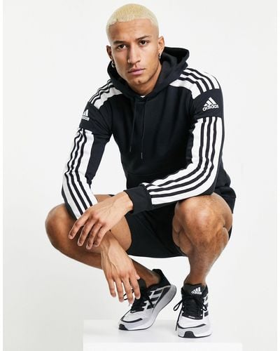 adidas Originals Adidas football - sweat à capuche à trois bandes sur les manches - Noir