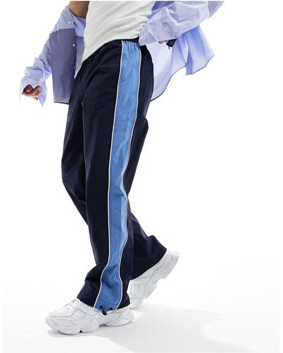 ASOS baggy Nylon Track Trousers - Blue