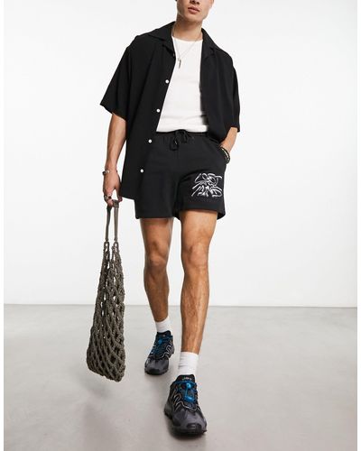 Coney Island Picnic Pantalones cortos s con estampado "lost mind" - Negro