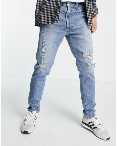 Abercrombie & Fitch – schmal geschnittene, zerschlissene jeans im stil der 90er - Blau