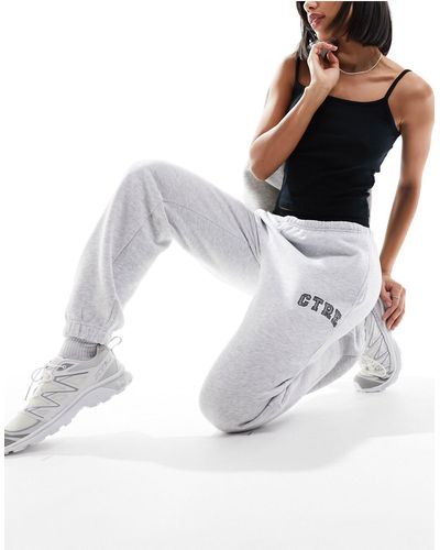 The Couture Club Varsity Relaxed Trackies - White