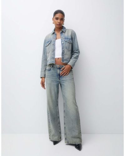 Pull&Bear Jeans oversize ampi slavato a vita bassa - Blu