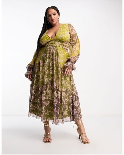 ASOS Asos design curve - robe mi-longue froncée à la taille avec imprimé fleuri varié et manches blousantes - Métallisé