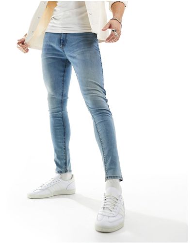 ASOS – hautenge jeans aus power-stretch - Blau