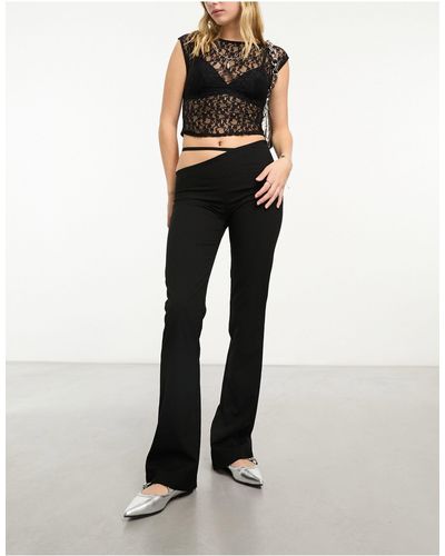 Weekday Aline Flared Trousers With Asymmetric Cut Out Waist Detail - Black