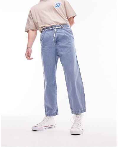 TOPMAN Jeans affusolati con pieghe sul davanti lavaggio medio - Blu