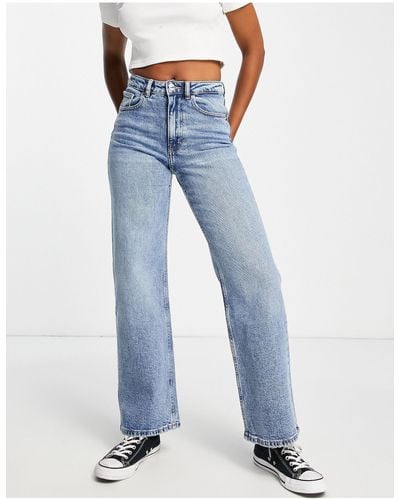 ONLY Juicy - jeans a vita bassa con fondo ampio lavaggio medio - Blu