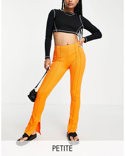 Topshop Unique Pantalon ajusté puis évasé à coutures apparentes - Orange