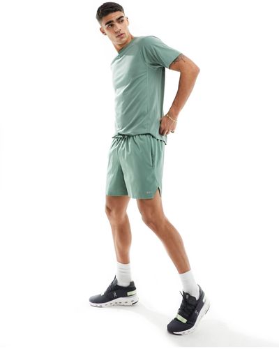 PUMA Running - evolve - pantaloncini da 5" chiaro - Verde